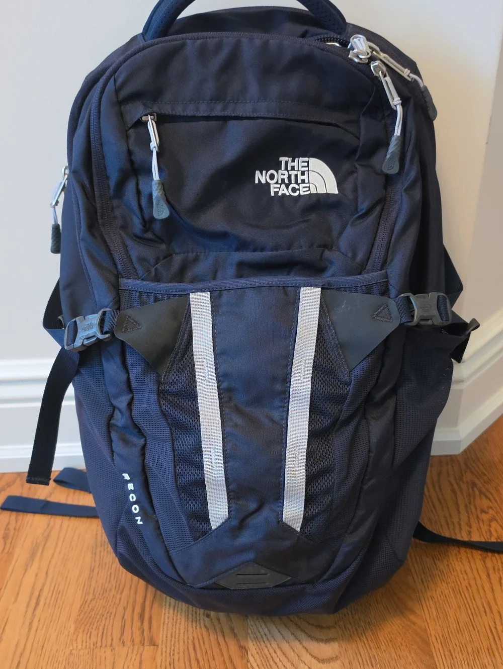 The North Face Navy Blue Backpack with Reflective Stripes